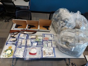 Search warrants executed in the municipalities of Saugeen Shores, Kincardine, and Brampton turned up over $120,000 in drugs and several firearms. Photo supplied