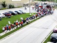 Hundreds of people begin their march to the Durham hospital from the community centre on Tuesday, May 21, 2024, as part of the Save the Durham Hospital committee's effort to reverse a decision to move 10 inpatient beds from the Durham site to Walkerton and Kincardine hospitals.