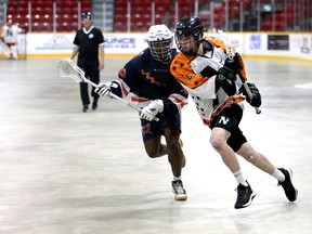 Noah Milsap drives wide on Noah Smiley as the Owen Sound North Stars host the Brooklin Merchants in their home opener inside the Harry Lumley Bayshore Community Centre on Saturday, May 25, 2024. Greg Cowan/The Sun Times