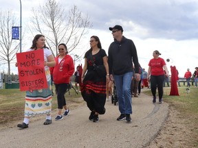 Walkers (l-r) Renee Gray, Penny White and Stacey and Joel Wright led the missing and murdered indigenous women, girls and two-spirit people (MMIWG2S) walk