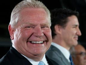 Ontario Premier Doug Ford reacts during an event at the Honda of Canada Manufacturing Plant 2 in Alliston, Ontario, Canada on April 25, 2024. (PETER POWER/AFP via Getty Images)