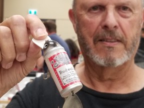 Among hundreds of fishing lures at the Canadian Antique Fishing Tackle Association show Sunday, June 9, 2024 in Owen Sound was this novelty fishing lure featuring a can of beer, held by Len Wood, of Strathroy.