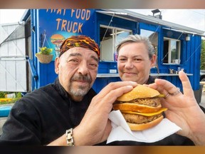 Anthony Pinheiro and Juanita Keddy of That Food Truck in Ingersoll are launching a new menu item, the Big Brother Burger, to raise suicide awareness after a family member recently died.  Photo taken on June 13, 2024. (Mike Hensen/ The London Free Press)