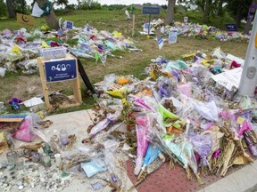 A memorial to the Afzaal family who were intentionally run down by a driver in London, Ont.. (Derek Ruttan/Postmedia)