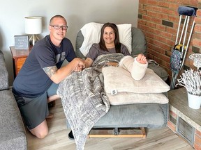 Jeremy and Meghan Proctor relax in their Simcoe-area home after enduring a six-day wait for surgery to repair her broken leg. Jeremy Proctor is fed up with Ontario's "broken healthcare system." SUBMITTED PHOTO