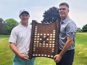 Winner Derek Dalziel, left, of London, Ont., receives the championship plaque from head pro Jamie Parkinson after winning the Sarnia Golf and Curling Club men’s invitational in Sarnia, Ont., on Saturday, June 22, 2024. (Supplied Photo)