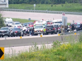 Emergency services respond to a collision on Highway 401 at the eastbound off ramp to Gardiners Road in Kingston, Ont.