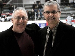 Mike Bennett, left, and Bill Saunders are inducted into the Chatham Maroon Alumni Association's Heart and Soul Volunteer Wall of Fame at Chatham Memorial Arena in Chatham, Ont., on Sunday, Nov. 28, 2010. Chatham Daily News File Photo