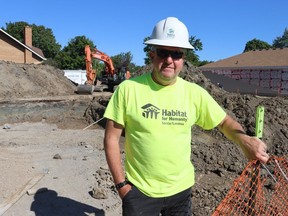 Darryl Blum, director of building services for Habitat for Humanity Sarnia Lambton, stands near where foundations are being dug in Sarnia for two new Habitat homes.