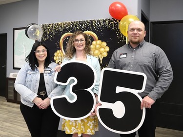 Jessica Montgomery, left, Brittney Ramakko, and Andrew Zarnke, of the Sudbury office of Occupational Health Clinics for Ontario Workers Inc., take part in an open house at 432 Westmount Ave. in Sudbury, Ont. on Friday June 7, 2024. The event was held to celebrate the new location in Sudbury and to mark the 35th anniversary of the organization in Ontario. John Lappa/Sudbury Star/Postmedia Network