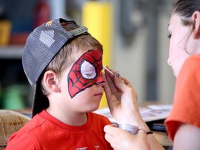 Blake Lockman, 4, sits patiently while having his face painted during Technica Mining's annual Family Fun Day at the company's headquarters on Fielding Road in Lively, Ontario on Saturday, June 15, 2024. Technica opened the event up to the entire community this year to celebrate its 25th anniversary, free of charge. If you wish to share a photo of your new baby or child, please send an email to dmacdonald@postmedia.com. Ben Leeson/The Sudbury Star/Postmedia Network
