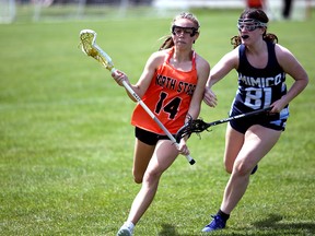 Aliviah McCall drives wide as the Owen Sound North Stars host Ontario Women's Field Lacrosse action at the Kiwanis complex in Owen Sound on Saturday, June 1, 2024. Greg Cowan/The Sun Times