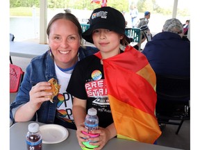 Maren Skipper and her kid Ruby joined the barbecue at Whitecourt's 2024 Pride Celebration