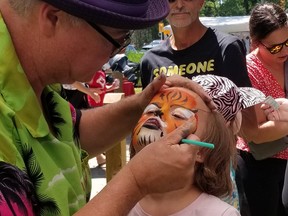 Eve Moore, 7, of Allenford, is tranformed into a painted tiger for Canada Day at celebrations in Owen Sound on Monday, July 1, 2024. (Scott Dunn/The Sun Times/Postmedia Network)