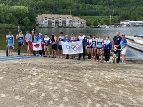North Bay Canoe Club members saluting the 2024 Olympic team