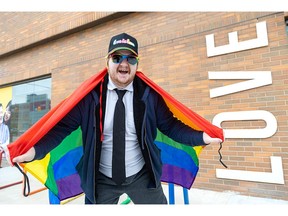 Nick Veal, volunteer co-ordinator of Pride Festival London, shows his excitement at this year's 10-day festival offerings in London on Friday, June 28, 2024. (Derek Ruttan/The London Free Press)