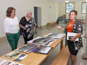 Lisa Hepfner (left) MP for Hamilton Mountain, and former Six Nations elected chief Ava Hill listen as Woodland Cultural Centre executive director gives a tour of the dining hall in the former Mohawk Institute Residential School on Wednesday July 3, 2024 in Brantford, Ontario. Hepfner announced $1.4 million in funding that will support exhibits inthe final phase of the Save The Evidence project. Brian Thompson/Brantford Expositor/Postmedia Network