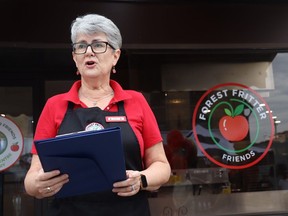 Co-founder Janet Cullen speaks outside the Forest Fritter Friends training centre for adults with disabilities at its grand opening Friday in downtown Forest.