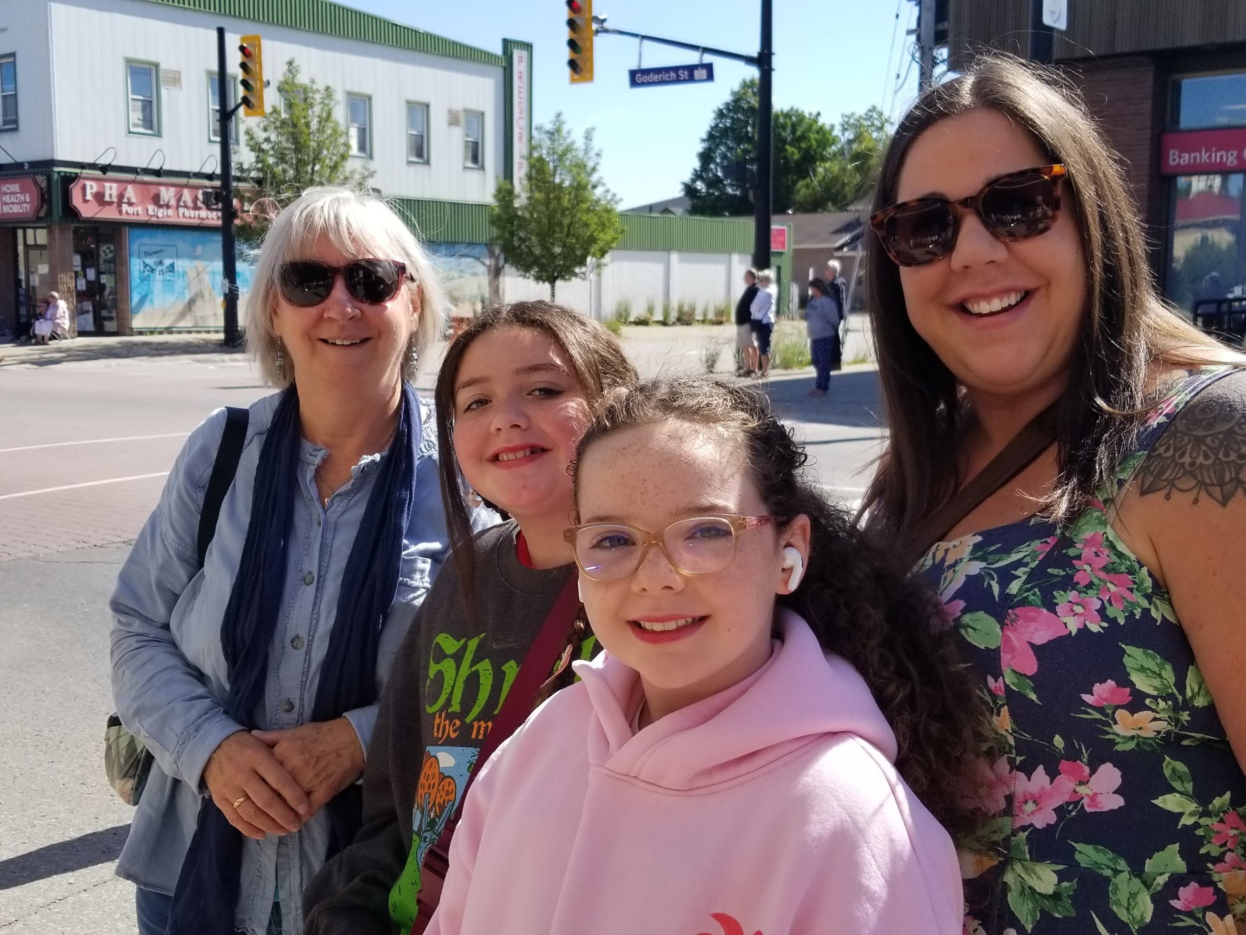 Waiting for the annual Labour Day parade in Port Elgin, from the left, Lynn Sanders, Harper Murphy, 11, Holly Murphy, 10, and Jessica Murphy on Monday, Sept. 2, 2024. (Scott Dunn/The Sun Times/Postmedia Network)