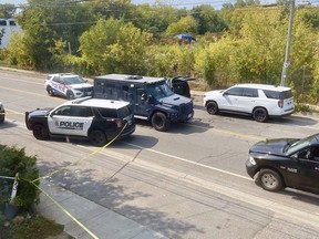 Kingston Police in the midst of negoitating with a man in Kingston, Ont., on Thursday, September 12, 2024. Police said three people had been attack and rushed to hospital in serious condition.