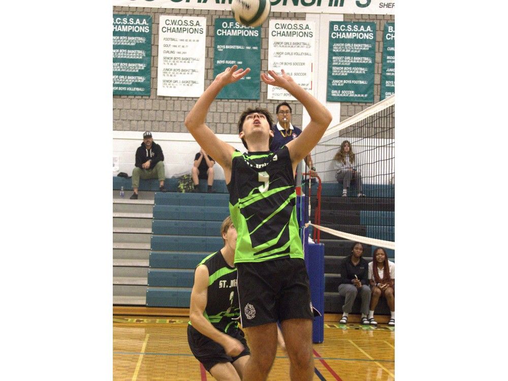 Jack Franks of St. John's College sets a teammate while playing Paris District High School during AABHN senior boys semifinal action on Monday at SJC. Brian Smiley