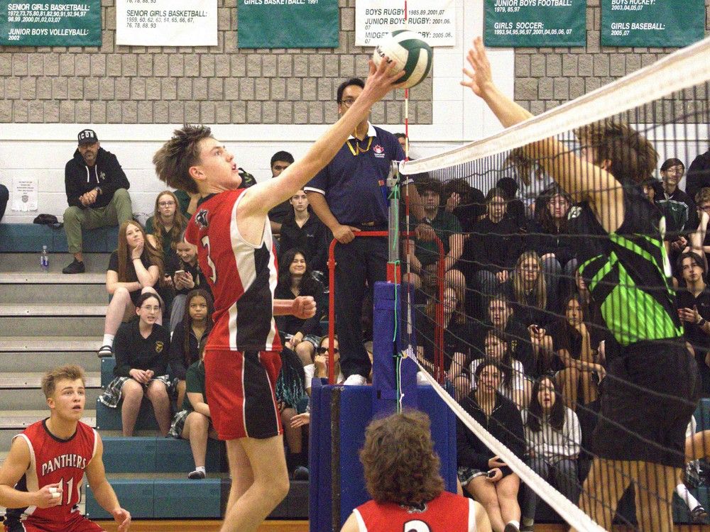 Dexter Quesnel of Paris District High School tips a ball against St. John's College during AABHN senior boys semifinal action on Monday at SJC. Brian Smiley