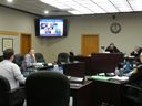 Members of the Cornwall police service board listen to a presentation from Rodney Wilson (at left, facing away from camera) on the service's corporate communications, on Thursday December 5, 2024 in Cornwall, Ont. Hugo Rodrigues/Cornwall Standard-Freeholder/Postmedia Network