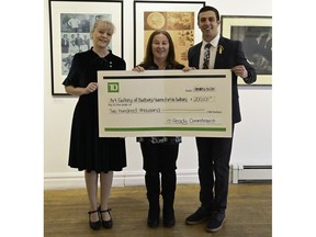 Tanya Desrosiers (left), district vice president of TD Canada Trust; Susan Levesque, fundraising and fund development officer for the Art Gallery of Sudbury; and Jeff Lafantaisie, regional manager for the Ontario/Indigenous Banking Group of TD mark a $200,000 contribution to the gallery. Supplied photo