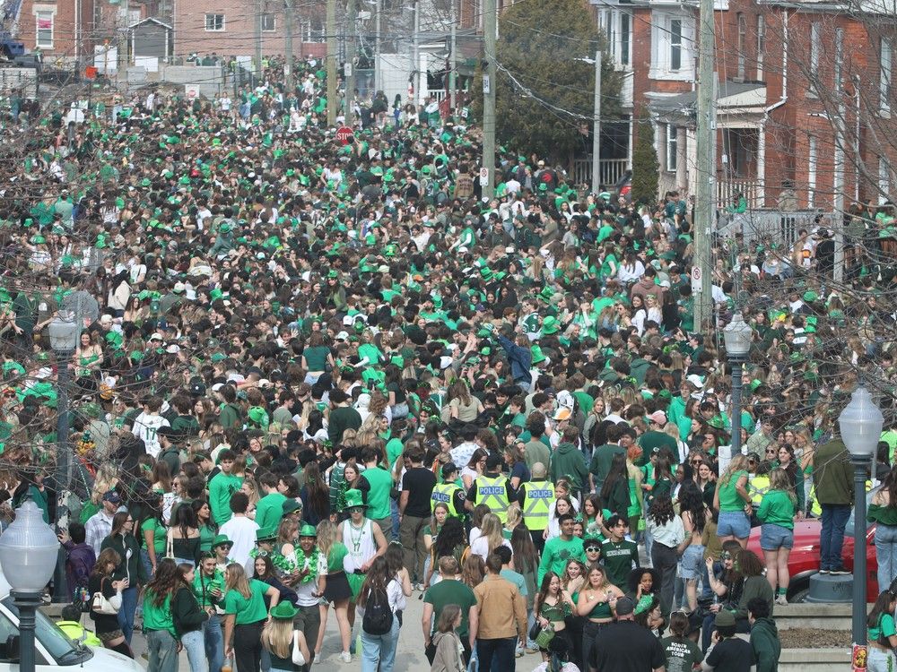 Thousands of students spill out onto Aberdeen Street during St. Patrick's Day celebrations