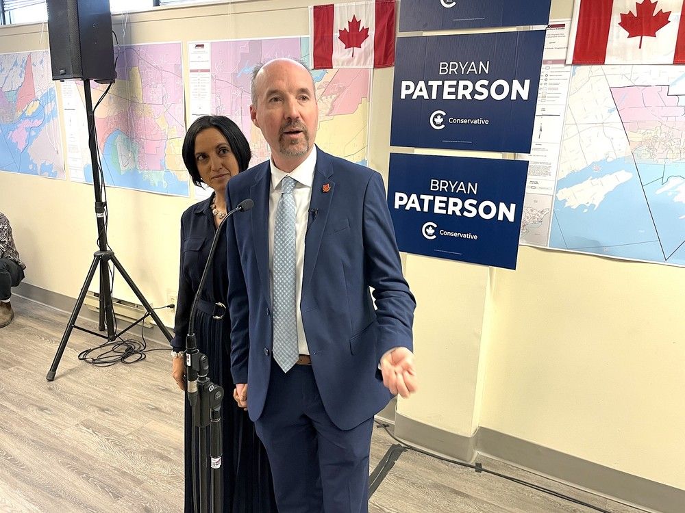 conservative candidate bryan paterson, seen with his wife shyla, speaks at his federal campaign launch in kingston last week.