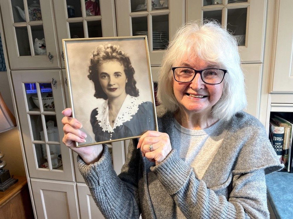 shirley tripp holds a photo of her mother veronica mcname who won a beauty pageant in 1943 in kingston, ont. on thursday, may 8, 2025. (elliot ferguson/the whig-standard/postmedia network)