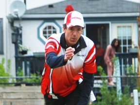 a man lawn bowling