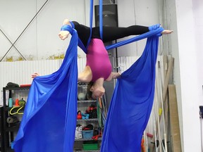 Sarah Rankin, an aerial silks coach and performer at the GymZone, performs during a press conference to promote Cirque d'hiver in Sudbury, Ont. on Thursday May 22, 2025. Cirque dÕhiver is a fundraiser for the Art Gallery of Sudbury and will be held at the Caruso Club on November 13. The evening will include a four-course dinner, table wine, art auction, circus style synergy with 10 local performers including Yes Theatre, Charm Plus, GymZone, Spotlight Dance, Kassandra Bazinet, ClaireÕs School of Dancing, Chris Theriault, earthdancers, Jasmine Wagg and No Promises band. Tickets are $200 each with a $75 tax receipt and are available online with CanadaHelps: https://www.canadahelps.org/en/charities/art-gallery-of-sudburygalerie-dart-de-sudbury/events/cirque-dhiver/. John Lappa/Sudbury Star/Postmedia Network