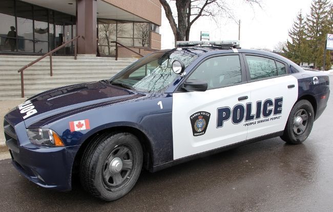 A man and a woman are facing a long list of charges following a break-in at a Sarnia home listed for sale, police say.