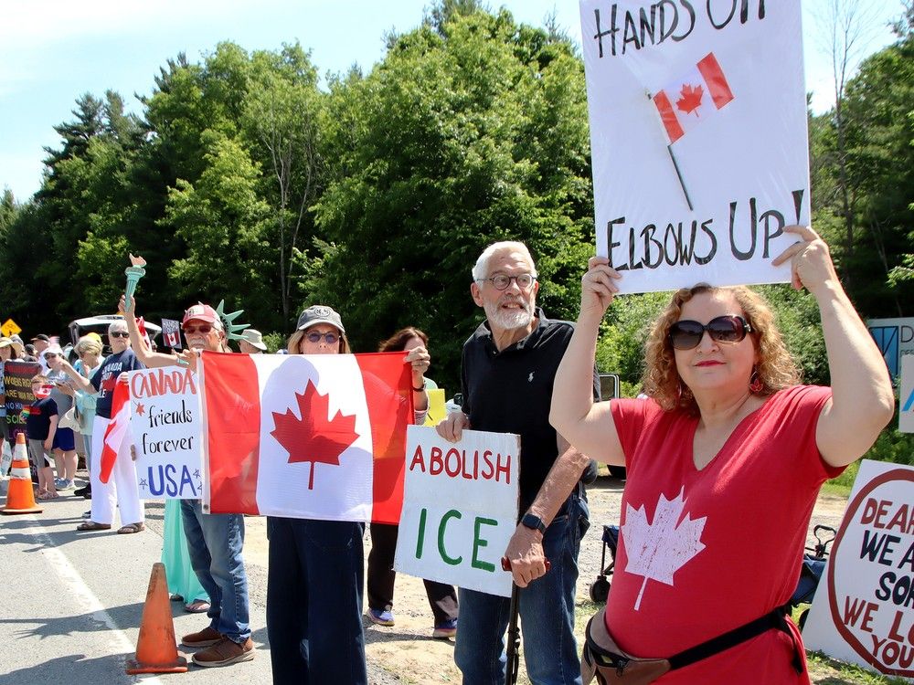 Friends along the border marching for Canada on Wellesley Island