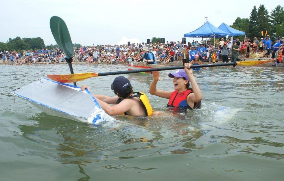 A cardboard boat sinks