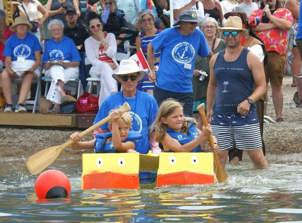 Dykstra brothers in their cardboard boat
