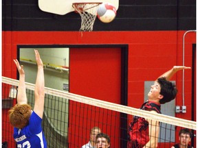 Paris Panthers unbeaten in senior boys volleyball 1 Paris District High School's Canaan Sherbino goes up to spike the ball during an AABHN senior boys volleyball game against McKinnon Park Secondary School on Tuesday at PDHS.