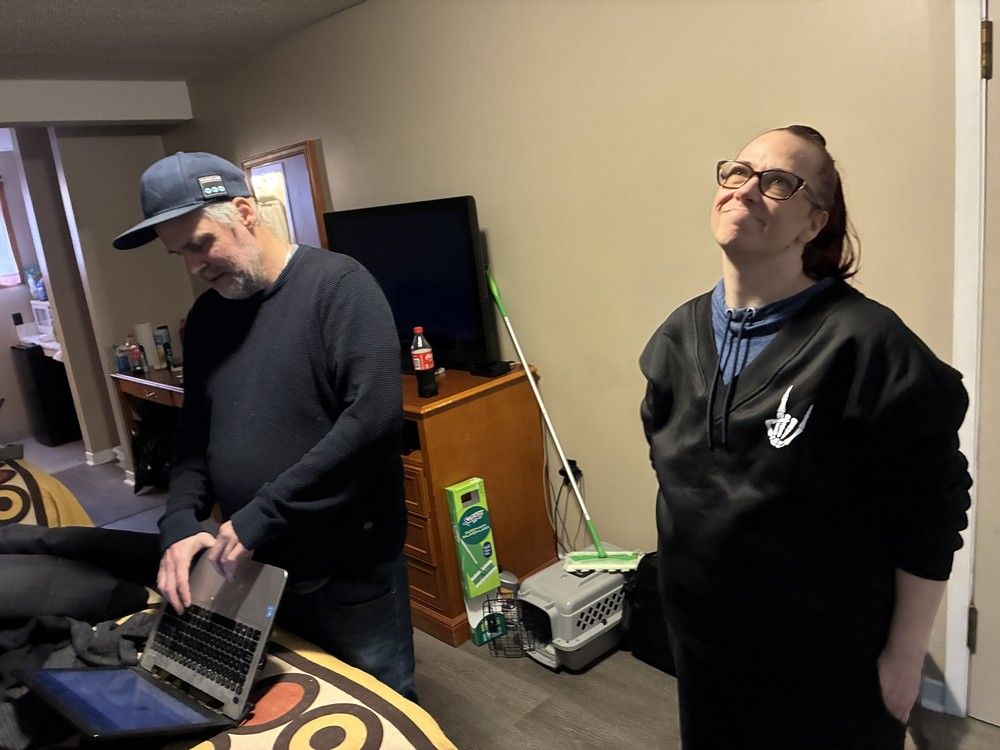  tammy ball and her partner paul wensing stand in the motel room where they have been staying since a downtown fire forced them out of their apartment in kingston last week.