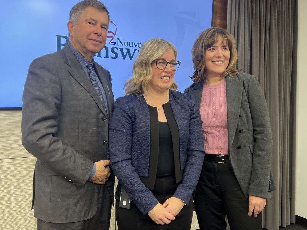 Dr. John Dornan, Premier Susan Holt and Lise Babin, president of the New Brunswick Medical Society