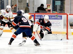 Timmins Rock forward Nolan Masson drills a shot past French River Rapids goalie Ethan Madden for his fourth goal of the season during the first period of Sunday afternoon’s NOJHL contest at the McIntyre Arena