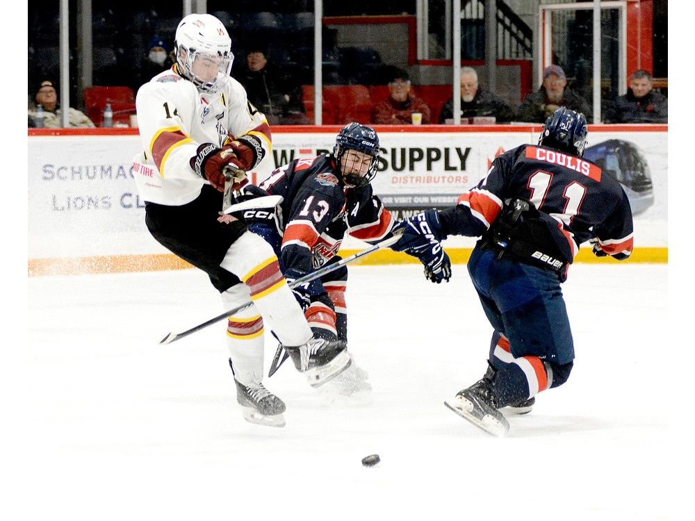 French River Rapids blue-line Ralph Coulis gets his stick between the legs of Timmins Rock forward Thomas Beard to perform a can-opener maneuver that would have made former Toronto Maple Leafs D-man Bryan McCabe smile during the first period of Sunday afternoon’s NOJHL contest at the McIntyre Arena