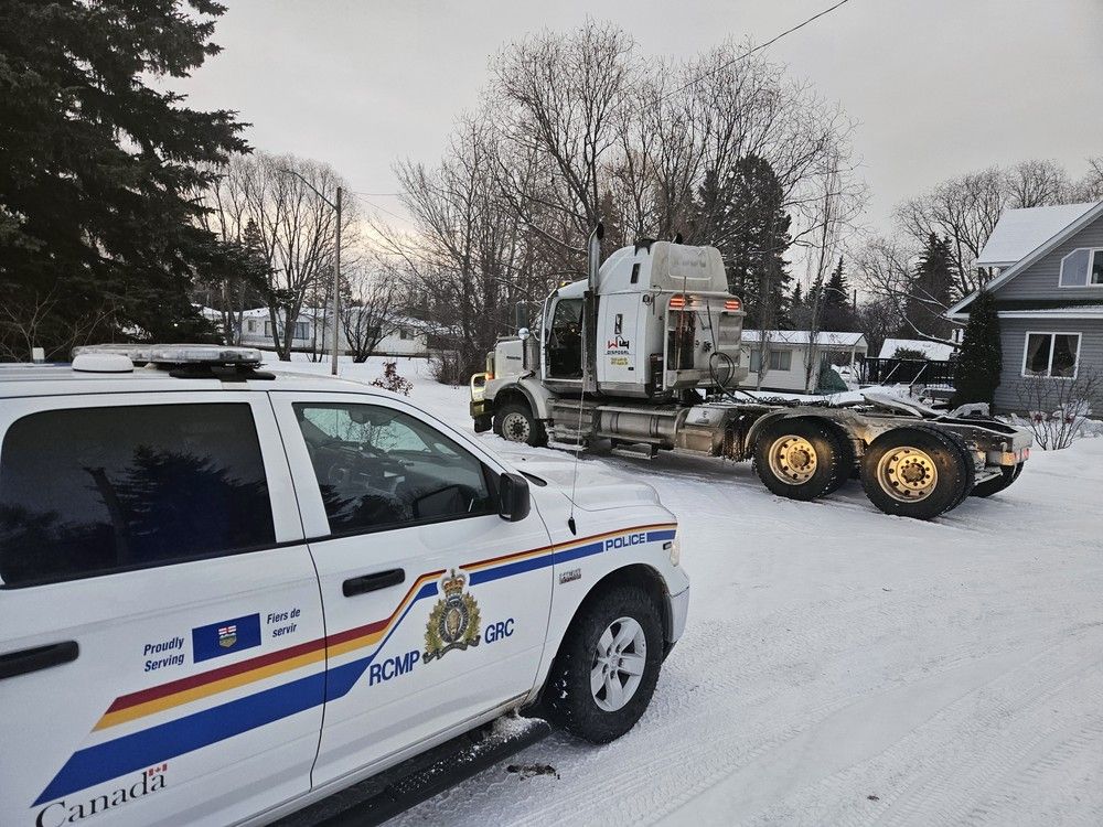 RCMP vehicle and semi truck