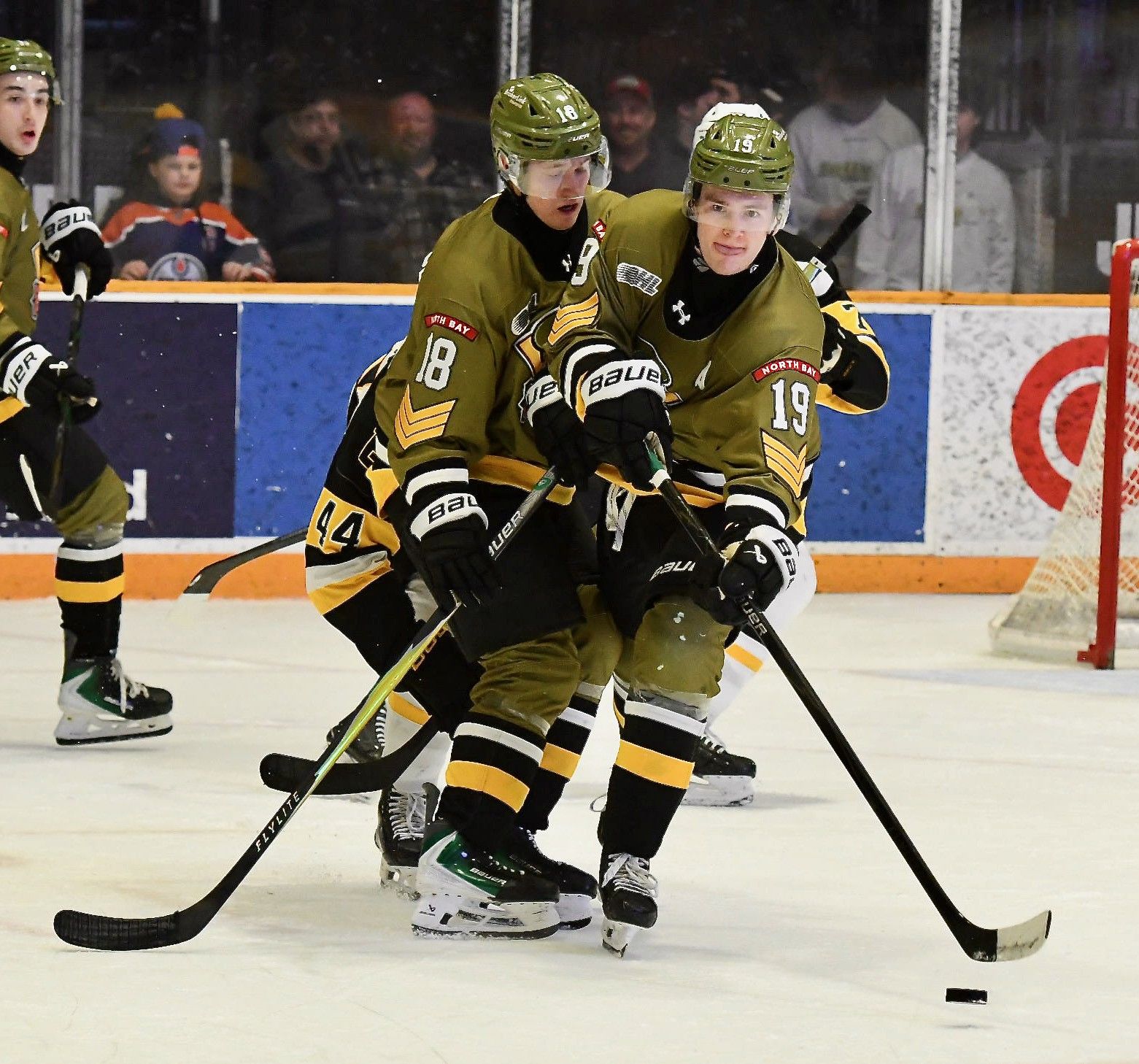 Junior hockey players on ice