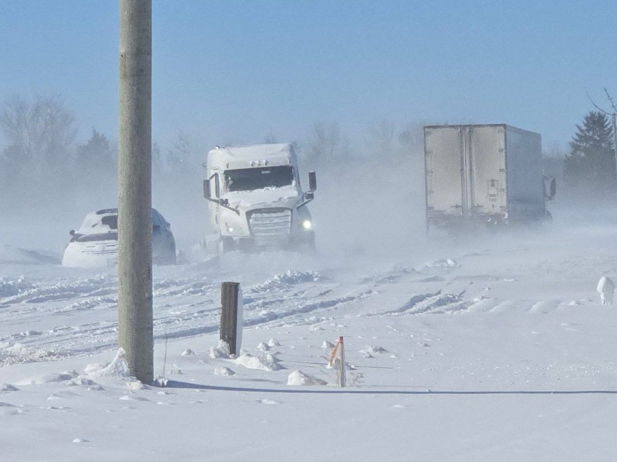 All of Highway 402 was closed Saturday morning, after a winter storm walloped the region