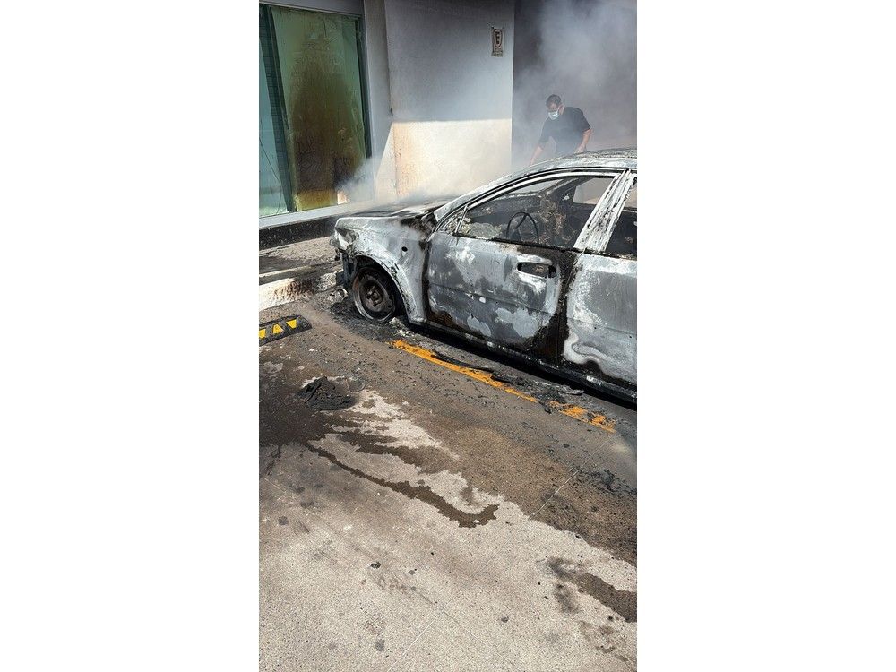  One of the car fires Mike Chilibeck of Ottawa helped to douse in Puerto Vallarta on Sunday.