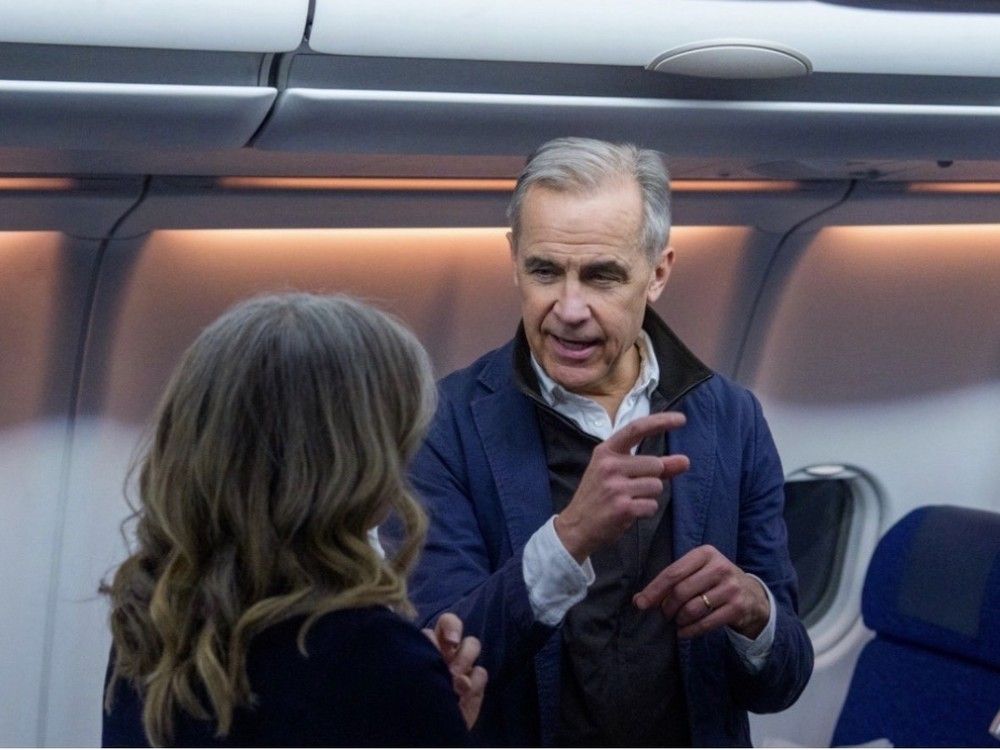 Holt’s India trip punctuated by two deals