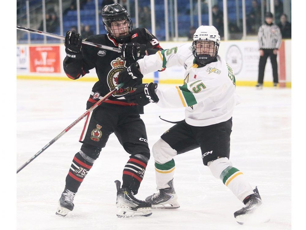  Sarnia Legionnaires’ Cole Abbey, left, checks St. Thomas Stars’ Cole Edmundson. (Mark Malone/Postmedia Network)
