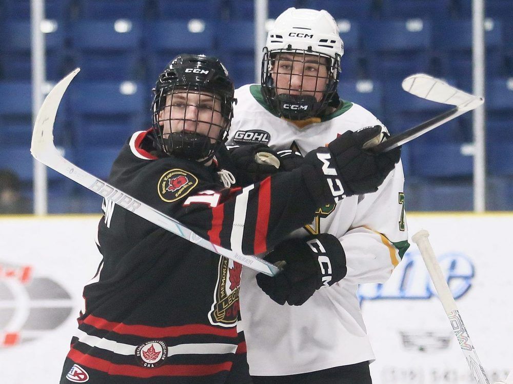 Sarnia Legionnaires’ Liam Nickerson, left, battles St. Thomas Stars’ Joey Buzzetta. (Mark Malone/Postmedia Network)