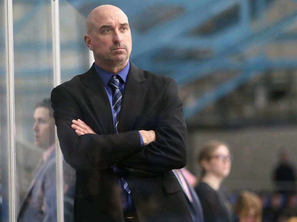  Sarnia Legionnaires head coach Mike Bondy watches Saturday’s game against the St. Thomas Stars, who clinched a Greater Ontario Hockey League playoff berth with a 5-0 win. (Mark Malone/Postmedia Network)